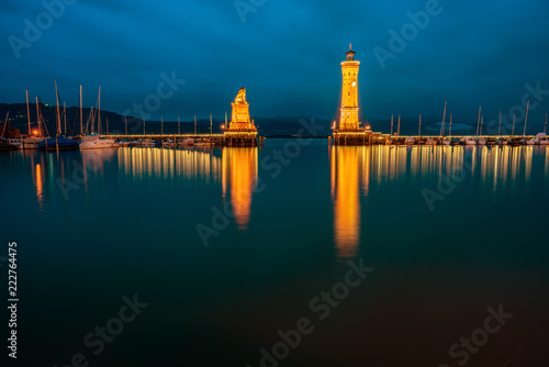 View of the harbor entrance and lighthouse in Lindau on Lake Constance.