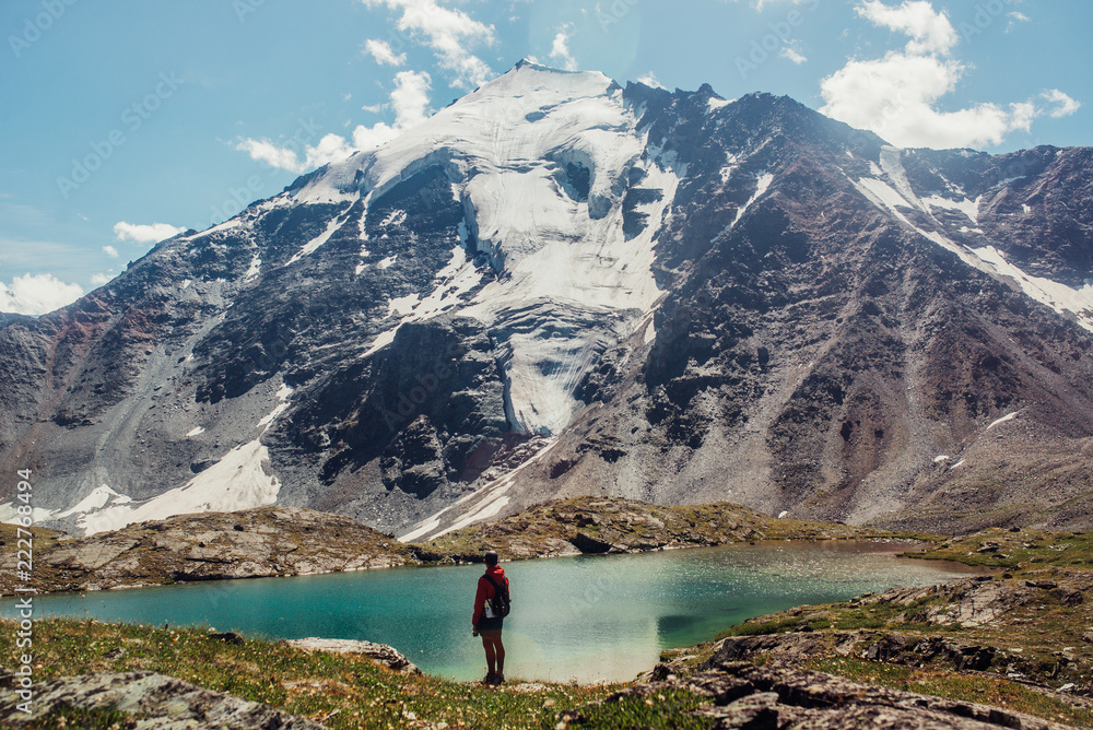 tourist at the lake in mountains