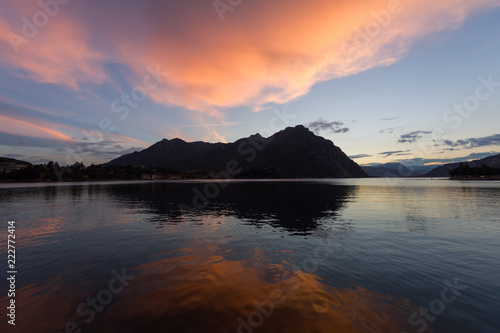 Sunset on Lake Como near Lecco with the silhouette of Mount Moregallo