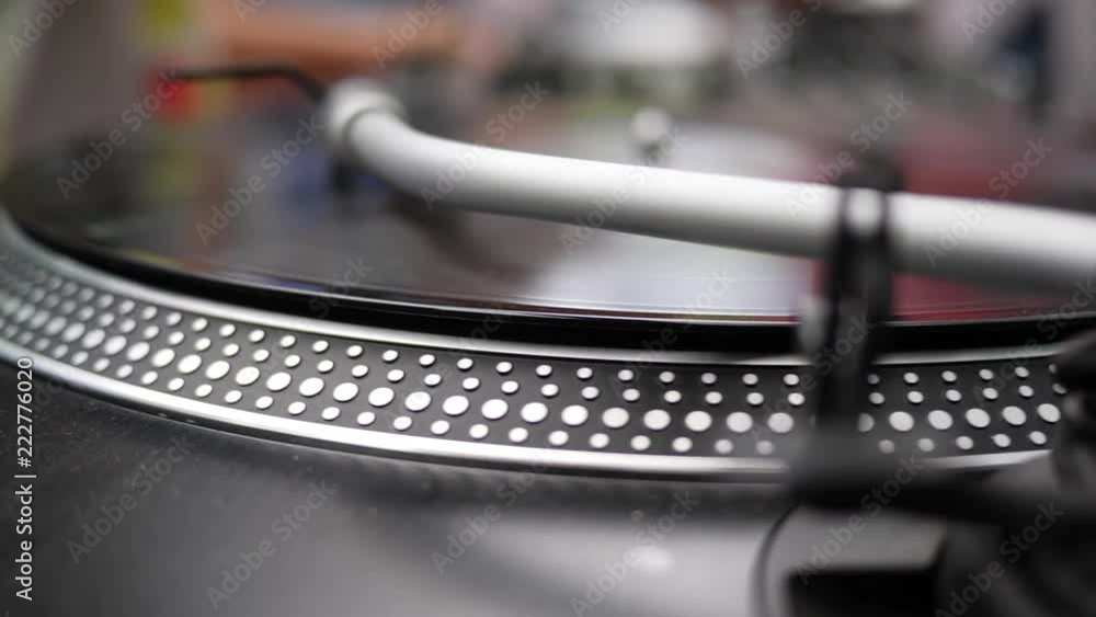 DJ Control with Turntable Vinyl plate in slow motion