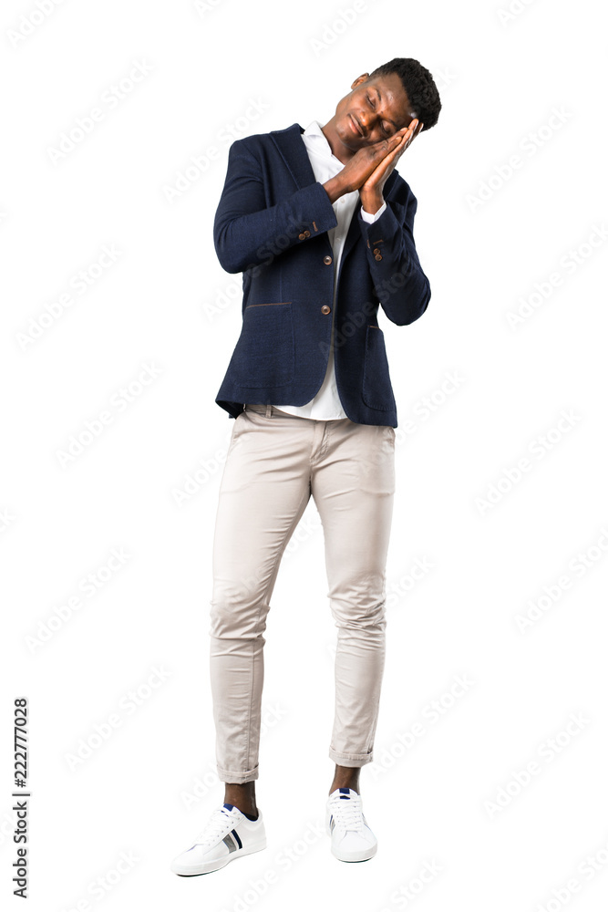 Full body of Handsome african american man wearing a jacket making sleep gesture. Adorable and sweet expression on white background Full body of Handsome african american man wearing a jacket making sleep gesture. Adorable and sweet expression on white background