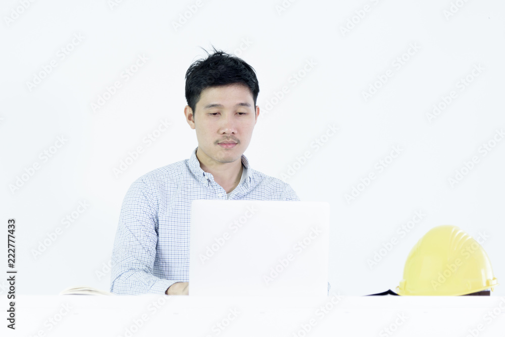 Asian employee engineer salary man sitting at desk and working with lazy and sleepy, isolated on white background. Asian employee engineer salary man sitting at desk and working with lazy and sleepy, isolated on white background.