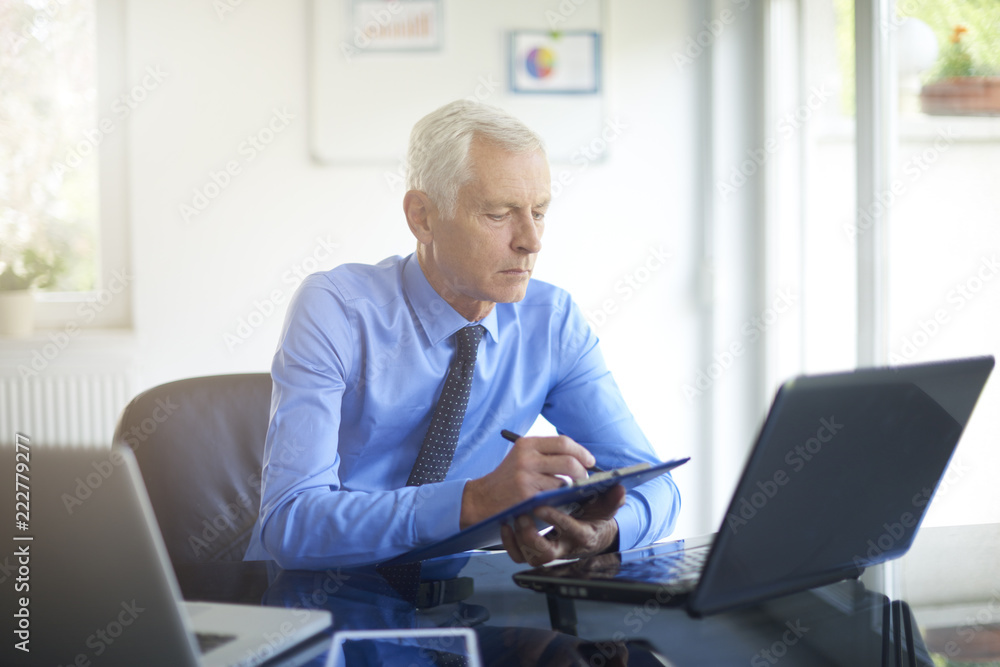 Businessman working in the office Businessman working in the office
