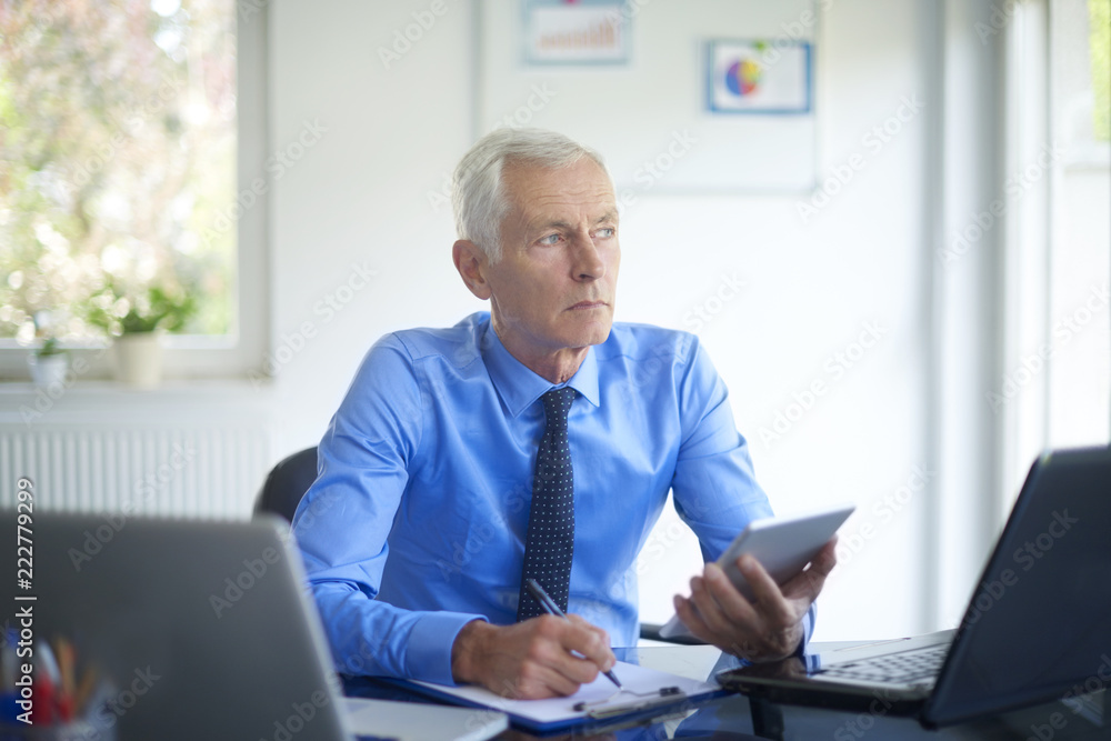 Executive businessman working in the office Executive businessman working in the office