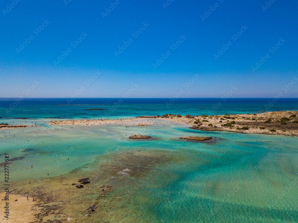 Aerial view to the beautiful beach and island of Elafonisi lagoon. Amazing wallpaper, photo from drone. Crete, Greece.
