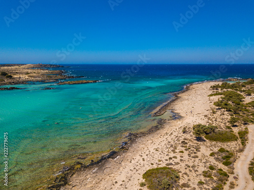 Aerial view to the beautiful beach and island of Elafonisi lagoon. Amazing wallpaper  photo from drone. Crete  Greece.