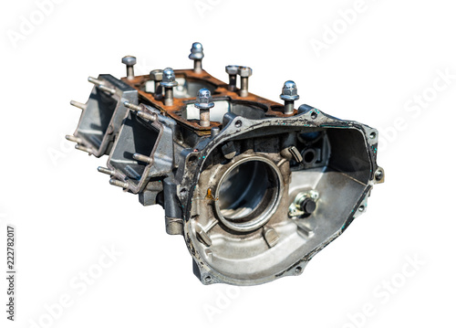 A disassembled block of a two-cylinder engine isolated on a white background with a clipping path.