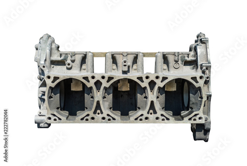 A disassembled of a three-cylinder engine block isolated on a white background with a clipping path.