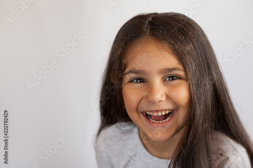 Happy laughing child girl. Healthy kid. Healthy teeth.