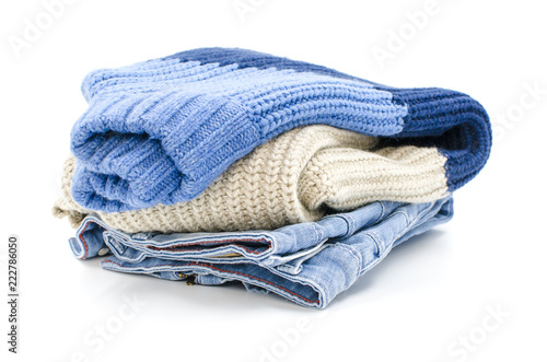A pile of clothes is on a white background