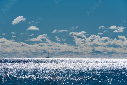 Boat on the water at mid day