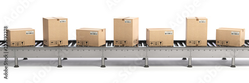 E-commerce, delivery and packaging service concept. Cardboard boxes on conveyor line isolated on white background. photo