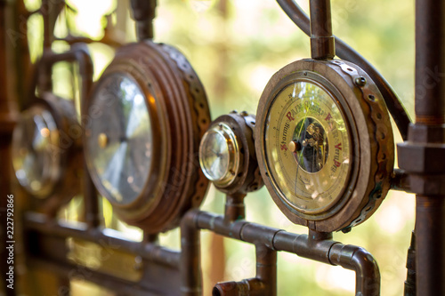 Closeup on a vintage dial meter with wood and copper photo