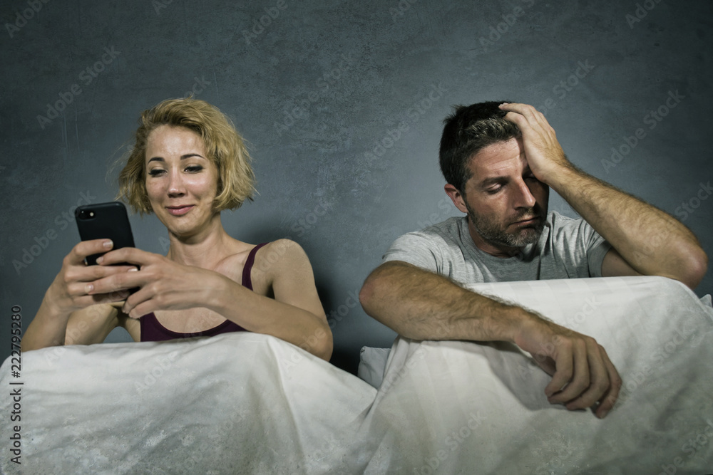 Mobile gadget dependence. Man bearded hipster play smartphone while  girlfriend relaxing near. Internet surfing and social networks. Mobile  internet addiction. Husband addicted internet online games Stock Photo -  Alamy