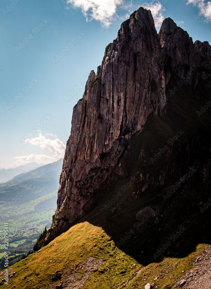 Obraz premium vertical crazy steep mountain rock formation, switzerland