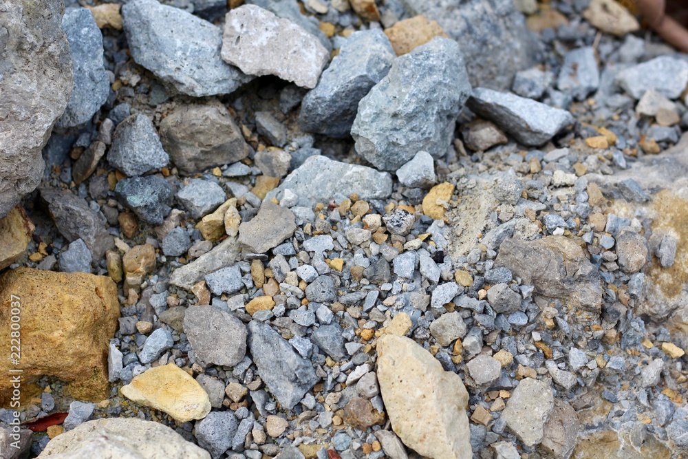 The rocks and stones texture on the ground. The rocks and stones texture on the ground.