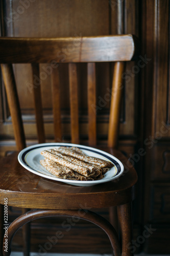 traditional French pancakes or crepes in an old rustic chair. French Breakfast concept