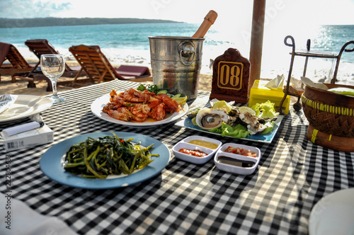 Seafood on the beach Jimbaran on Bali photo