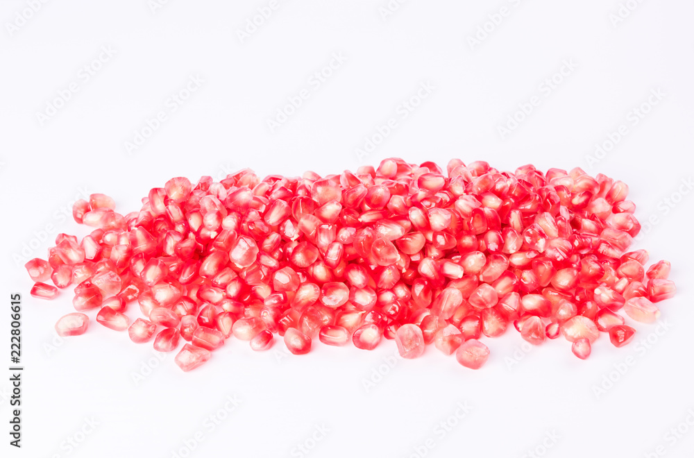 Pomegranate - fresh fruit seeds on white background Pomegranate - fresh fruit seeds on white background