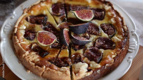 Delicious Tart With Fresh Figs And Goat Cheese On Rustic Wooden Table
