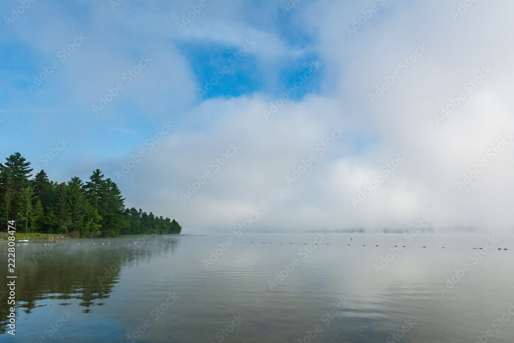 Foggy morning view of Webb Lake from Mt. Blue State Park campground