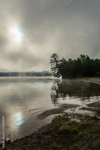 Foggy morning view of Webb Lake from Mt. Blue State Park campground