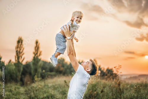 Father and his little son have fun outdoor