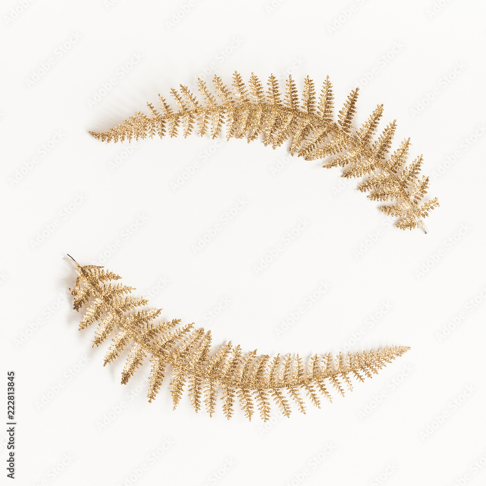 Christmas composition. Wreath made of golden decorations on white background. Christmas, winter, new year concept. Flat lay, top view, copy space, square Christmas composition. Wreath made of golden decorations on white background. Christmas, winter, new year concept. Flat lay, top view, copy space, square