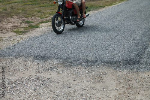 Asphalt and gravel road.