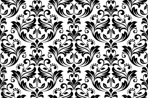 Wallpaper in the style of Baroque. Seamless vector background. White and black floral ornament. Graphic pattern for fabric, wallpaper, packaging. Ornate Damask flower ornament
