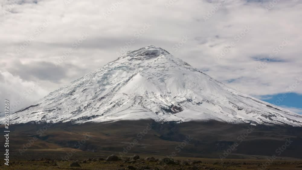 Cotopaxi Volcano after a heavy snowfall. Situated in the Ecuadorian Andes, at 5897m is one of the worlds highest volcanoes. Vapour is emanating from fumaroles near the summit. Cotopaxi Volcano after a heavy snowfall. Situated in the Ecuadorian Andes, at 5897m is one of the worlds highest volcanoes. Vapour is emanating from fumaroles near the summit.