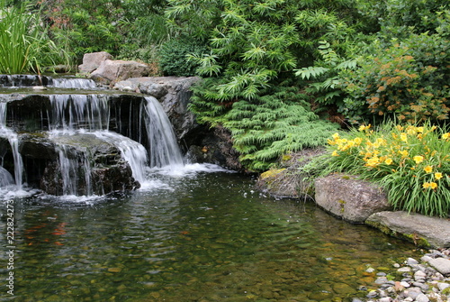 The waterfall and pond are very peaceful.