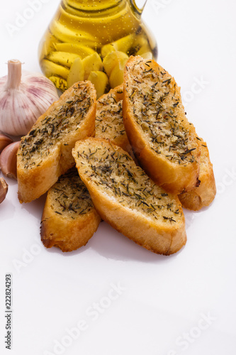 fragrant garlic bread on a white acrylic background