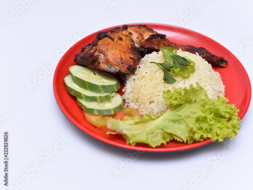 a set of a plate of chicken rice