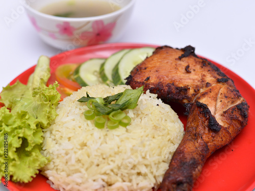 a set of a plate of chicken rice photo