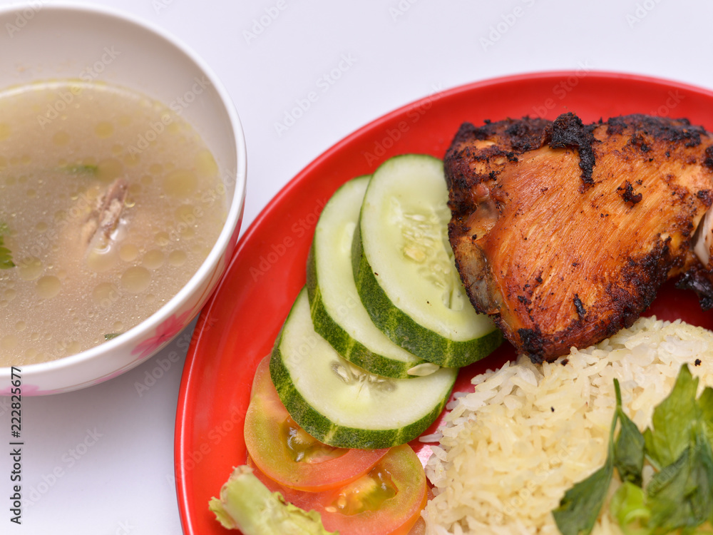 a set of a plate of chicken rice a set of a plate of chicken rice