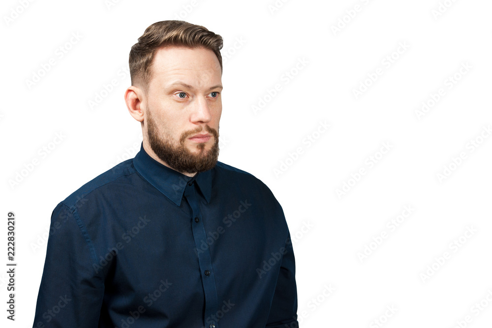 Portrait of young man dressed on a blue classic shirt. Businessman isolated on a white background. Portrait of young man dressed on a blue classic shirt. Businessman isolated on a white background.