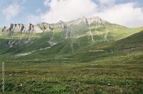 Caucasian Mountain in summer. Cross Pass in Georgia. Gudauri District. Source of Aragvi River.  photo