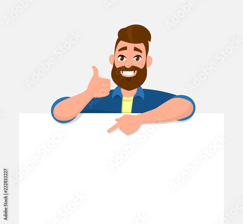 Happy young man holding/showing/displaying white blank board/banner/poster and pointing index finger towards that while thumbs up/like or deal sign. Concept illustration in vector cartoon style.