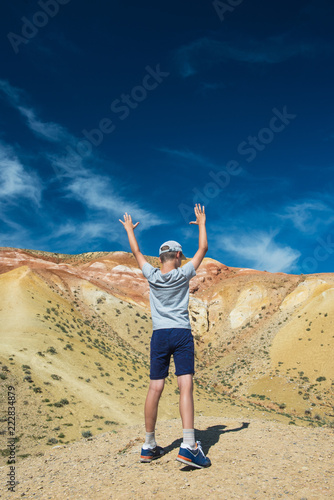 Teen boy in valley of Mars ...