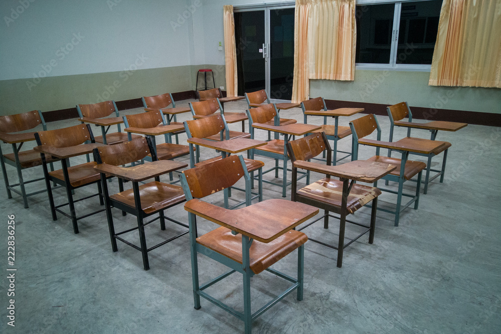 University classroom with many wooden chairs
