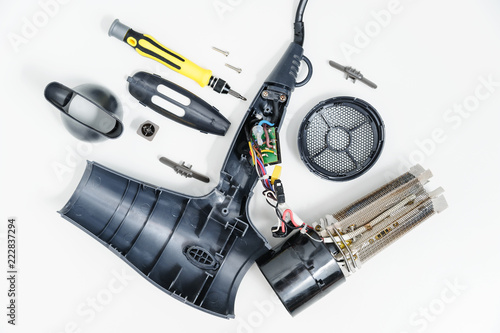 Hair dryer in a disassembled condition