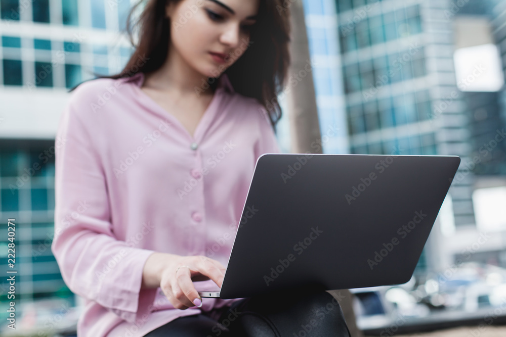 Close up shot, young businesswoman checking report on laptop, crop image of manager busy working with pc, female hands typing on computer keyboard sitting near her office Close up shot, young businesswoman checking report on laptop, crop image of manager busy working with pc, female hands typing on computer keyboard sitting near her office