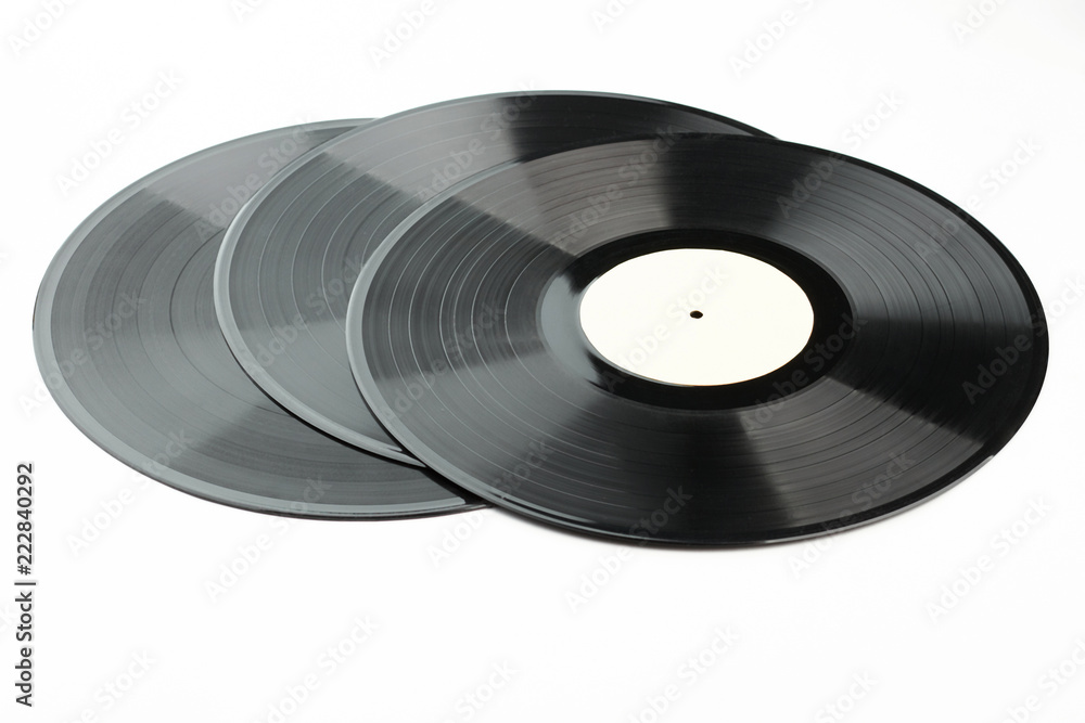 Set of vinyl records over white background. Three gramophone plates. Retro music objects. Set of vinyl records over white background. Three gramophone plates. Retro music objects.