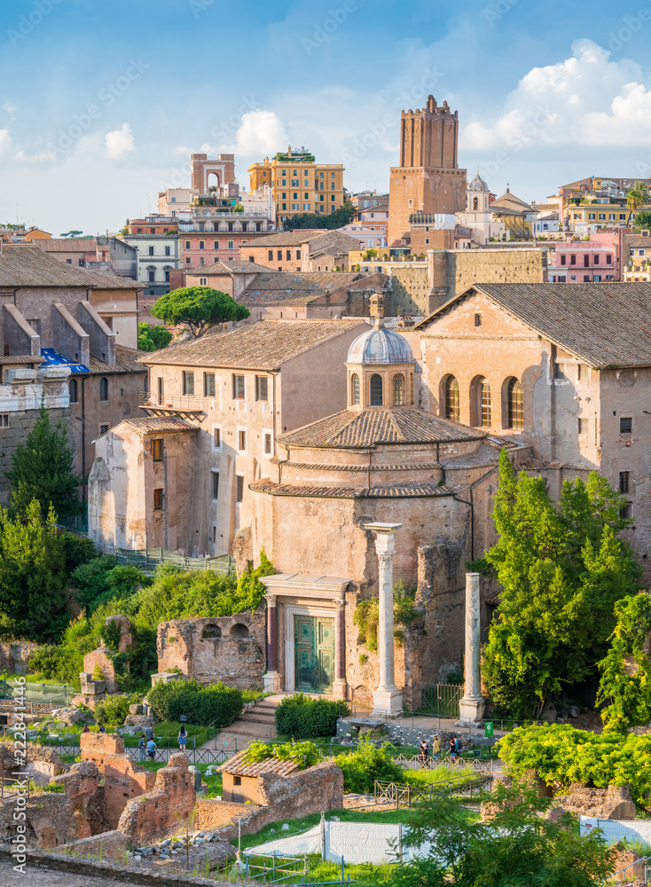 Scenic sight in the Roman Forum, with the Temple of Romulus and the Tower of the Militia. Rome, Italy.