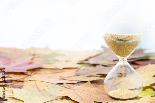 Daylight Saving Time. Wall Clock going to winter time. Autumn abstraction. photo