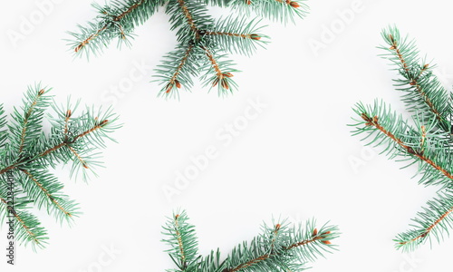Christmas composition. Frame made of fir branches on white background. Flat lay  top view  copy space. 
