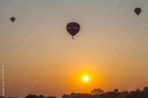 sweet sunrise on the back of hot air balloons festival at Shingha Park in Chiang Rai.