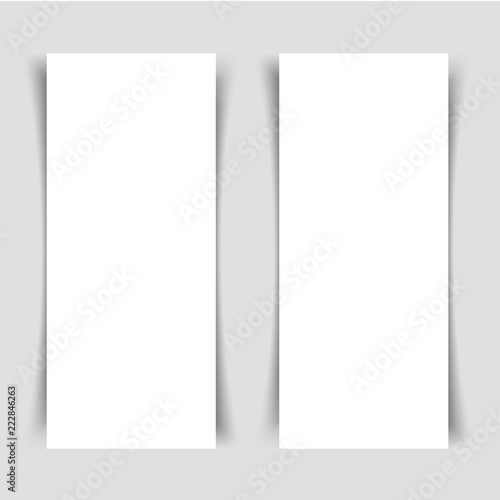 Mok-up of two narrow vertical flyers with shadow on a gray background. Template for the presentation of banners, posters, postcards and invitations. Vector illustration.