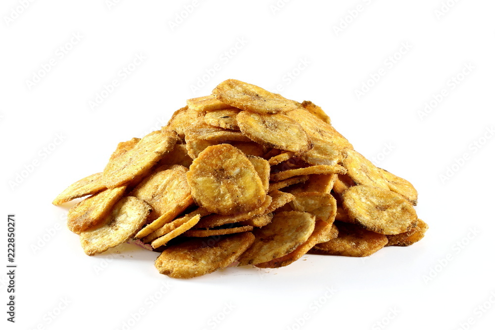 spicy salty banana chips or wafers with herbs masala traditional indian gujarati snack isolated on a white background
